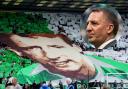 The giant tifo of Celtic great Tommy Burns at Rugby Park last night, main picture, and Parkhead manager Brendan Rodgers, inset