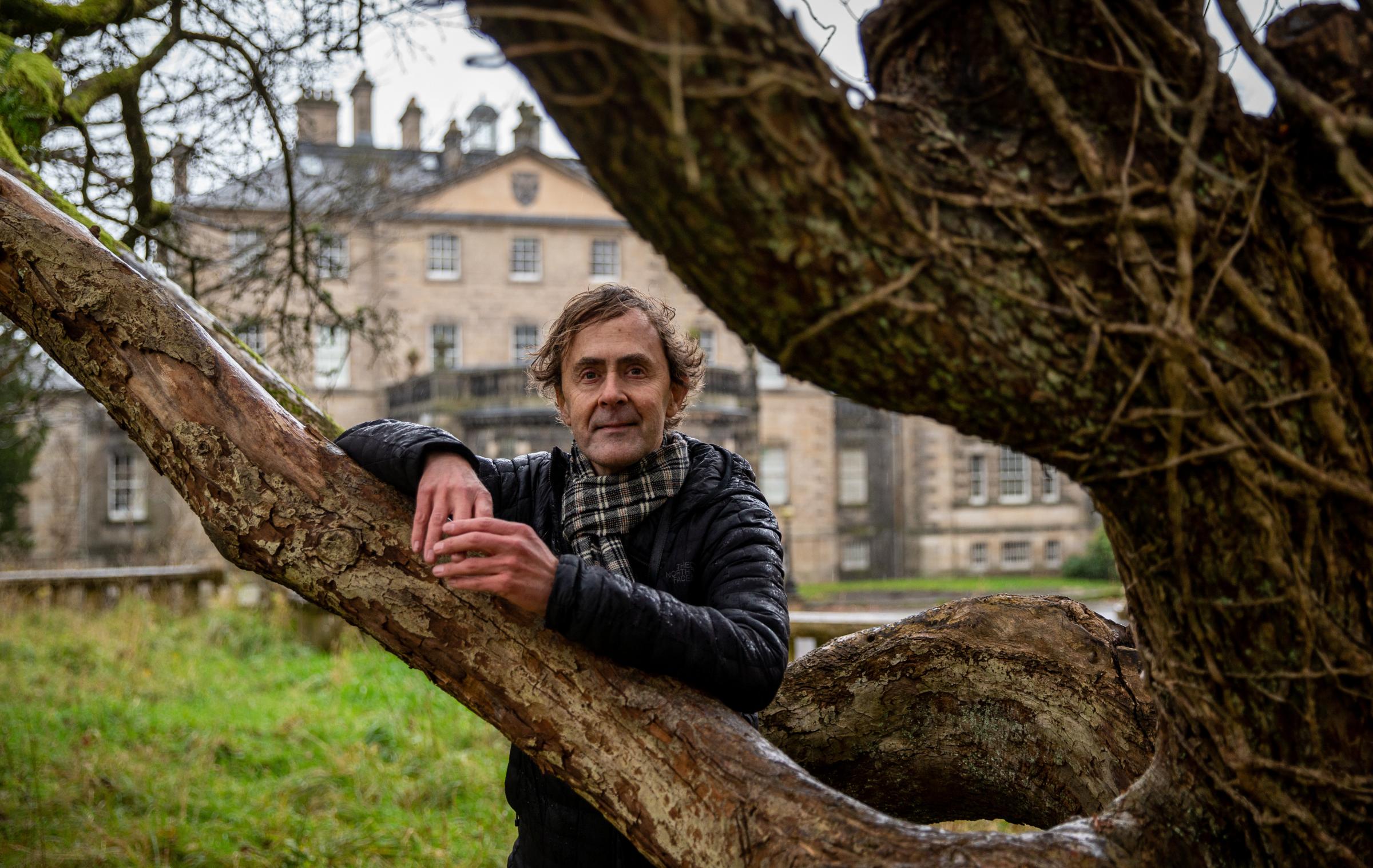 Artist Alec Finlay pictured in front of Pollok House at Pollok Country Park, Glasgow. Photograph by Colin Mearns.