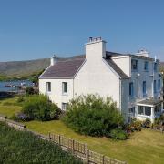 With an enviable location on the Isle of Scalpay, this five-bedroomed home served as a successful B&B for years