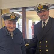 CalMac's Captain Iain McKenzie with Donald MacAskill (left),