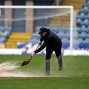Dundee's game against Rangers was postponed at the last minute on Sunday despite the best efforts of the Dens Park ground staff.