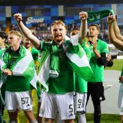 Liam Scales celebrates Celtic's latest Scottish title win at Rugby Park on Wednesday night