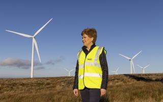Former First Minister Nicola Sturgeon in a past visit to a wind farm