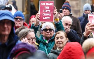 Protesters demonstrate outside the Scottish Parliament as the Hate Crime Law comes into force on April 01