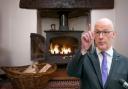 Swinney urged to overturn 'deeply damaging' ban on wood burning stoves