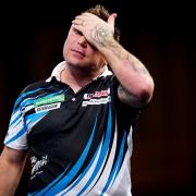 Gerwyn Price was dumped out of the World Darts Championship (John Walton/PA)