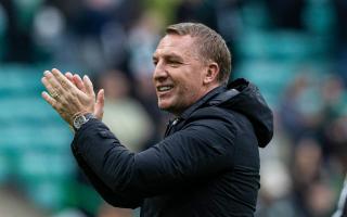 Celtic manager Brendan Rodgers celebrates after beating Hearts at Celtic Park