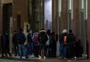 People queue outside the Overnight Welcome Centre in Glasgow