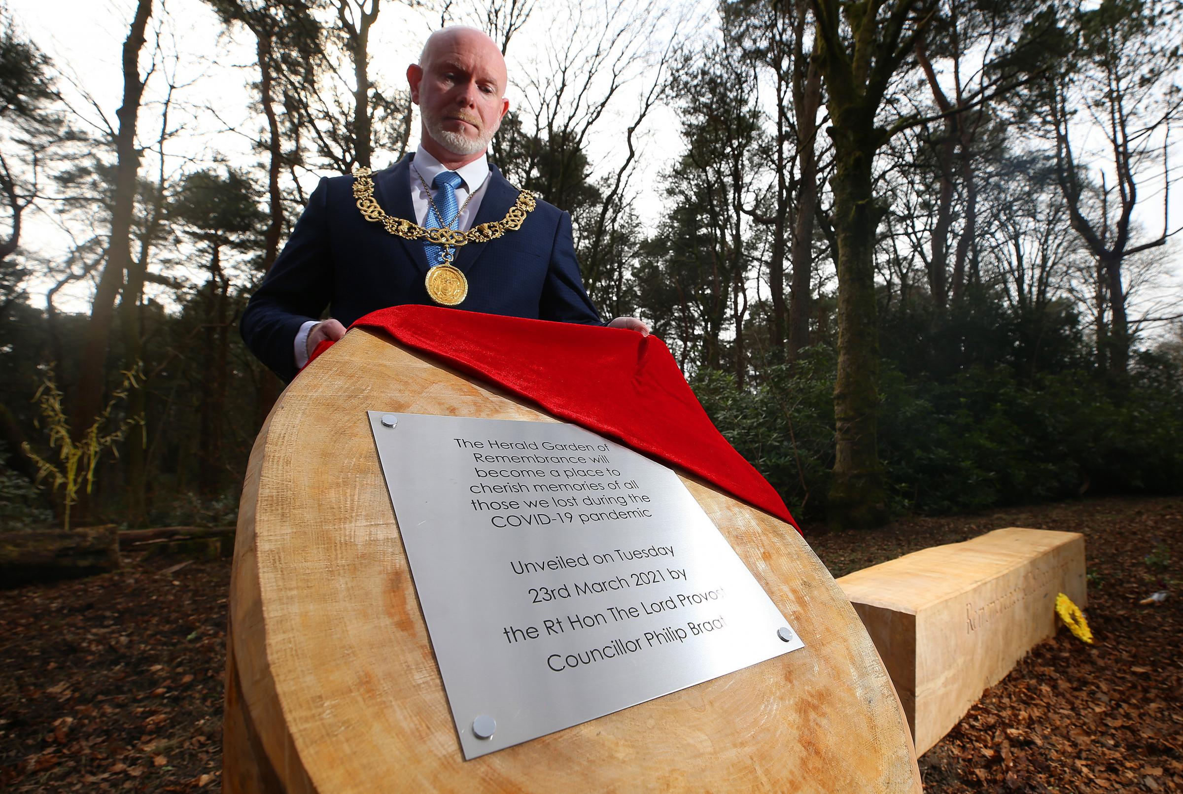 The plaque is unveiled by Lord Provost of Glasgow Philip Braat in Pollok Park to mark the site reveal of the Garden of Remembrance. Photo by Gordon Terris.