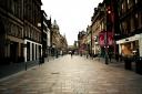 Coronavirus Pandemic. A quiet Buchanan Street, Glasgow at 5.30pm on Saturday 21st March. Cafes, pubs and restaurants are temporarily closed after the government ordered the closures to help fight the Covid-19 pandemic...  Photograph by Colin Mearns.21