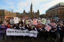 UNISON women pictured in George Square in Glasgow, Saturday 10 February, continuing their demand for equal pay from Glasgow City Council. The march was led by 30 women dressed as suffragettes.
 The women are part of UNISON’s equal pay campaign. Havi