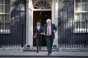 Chancellor of the Exchequer Rishi Sunak (left) and Prime Minister Boris Johnson leave 10 Downing Street, for a Cabinet meeting to be held at the Foreign and Commonwealth Office (FCO) in London, ahead of MPs returning to Westminster after the summer