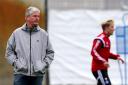 Bernhard Peters oversees a training session in Germany