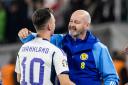 Scotland manager Steve Clarke congratulates Lawrence Shankland after his late equaliser against Georgia.