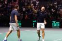 Great Britain’s Neal Skupski and Dan Evans celebrate victory over France in the Davis Cup last year (Martin Rickett/PA)