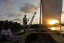 AFRICAN IDYLL: Fishermen on a dhow at Lamu Island, a Kenyan resort close to the Somali border and near the scene of the attack. Picture: EPA