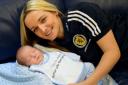 TACKLING FLU HEAD ON: Scotland striker Suzanne Grant and her son Oscar are both fighting fit after getting vaccinated before she gave birth. Picture: Mark Runnacles