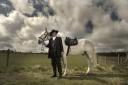 Grant completes his look with a cowboy's essential companion - a trusty steed - at Tower Farm Riding Stables in Edinburgh