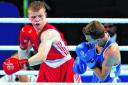 Charlie Flynn, left, in action during his Commonwealth gold medal-winning bout against Joe Fitzpatrick of Northern Ireland. Picture: Colin Mearns