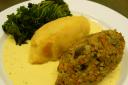 Vegan haggis, neeps and tatties with kale and a whisky cream sauce