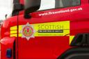 Man rushed to hospital after Clydebank flat blaze