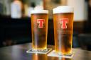 Get a photo of your airport pint for a chance to win Tennents goodies