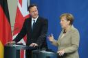 THE EUROPE PROBLEM: German Chancellor Angela Merkel and Prime Minister David Cameron held talks during his tour of EU member state capitals to persuade leaders on the case of EU reforms