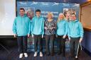 Lesley Whitehead receives the Tennis Scotland award with four players from the Glasgow Disability Tennis programme