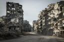 The destroyed neighbourhood of Khalidiya in the Old City of Homs, Syria. Homs has been witness to some of the worst fighting of the Syrian conflict and the Old City district now lies in ruins. The area is largely uninhabitable however a few people are att