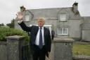 Tycoon Donald Trump at the house in Tong, on the Isle of Lewis, where Donald Trump's mother was brought up before she emigrated to the United States.