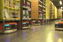 Robots working in an Amazon fulfilment centre