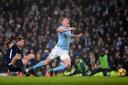 Jan Vertonghen of Spurs fouls Kevin De Bruyne of Manchester City to concede a penalty