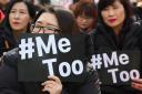 South Korean demonstrators hold banners during a rally to show the #MeToo movement has gradually gained ground. Picture: Jung Yeon-Je/AFP/Getty
