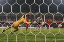 England's Harry Kane (centre right) scores his side's fourth goal