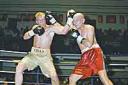 Both boxers connect in the gruelling 10 round bout 