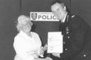 Police volunteer Patsy Middleton receives an award for her hard work from Assistant Chief Constable Steve Love