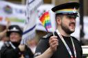Police officers take part in the Pride Glasgow parade through the city centre (Credit: David Cheskin/PA Wire)