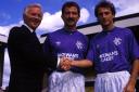 Trevor Francis (right) is welcomed by Ibrox by chairman David Holmes and player/manager Graeme Souness