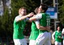 The Hibs players celebrate making it 2-0