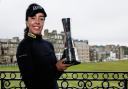 Georgia Hall poses with the AIG Women's Open trophy