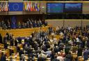 MEPs of the European Parliament, some holding hands, rise to sing 'Auld Lang Syne' following a historic vote on the Brexit agreement at a session of the European Parliament on 29 January paving the way for the UK's exit from the EU.