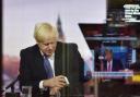 Prime Minister Boris Johnson checks his watch ahead of an interview on The Andrew Marr show. Picture: Jeff Overs/PA/BBC