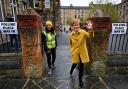 First Minister and leader of the SNP Nicola Sturgeon and candidate Roza Salih arrive to cast votes in the Scottish Parliamentary election at the Annette Street school in Govanhill, Glasgow. Photo: Jeff J Mitchell/PA.