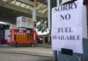 Petrol retailers warn pumps running dry because of panic-buying