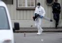 Police work near a site after a man killed some people in Kongsberg, Norway, Thursday, Oct. 14, 2021. A man armed with a bow and arrows killed several people Wednesday near the Norwegian capital of Oslo before he was arrested, authorities said. (Terje