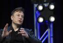 FILE - Tesla and SpaceX Chief Executive Officer Elon Musk speaks at the SATELLITE Conference and Exhibition in Washington. Musk won't be joining Twitter's board of directors as previously announced. The tempestuous billionaire remains
