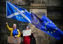 Remain supporters gather outside the Court of Session to hear the result of a petition asking judges to enforce a legislation passed by MPs aimed at preventing a no deal Brexit on October 9, 2019 in Edinburgh, Scotland. Photo Jeff Mitchell/Getty