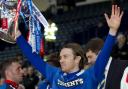 Rangers star Sasa Papac celebrates with the Co-operative Insurance Cup