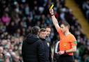 Lee Johnson received a touchline ban after being booked at Celtic Park.