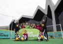 Sam Kerr and Kenny Miller attend an event to promote the re-opening of McDonald's Fun Football centres